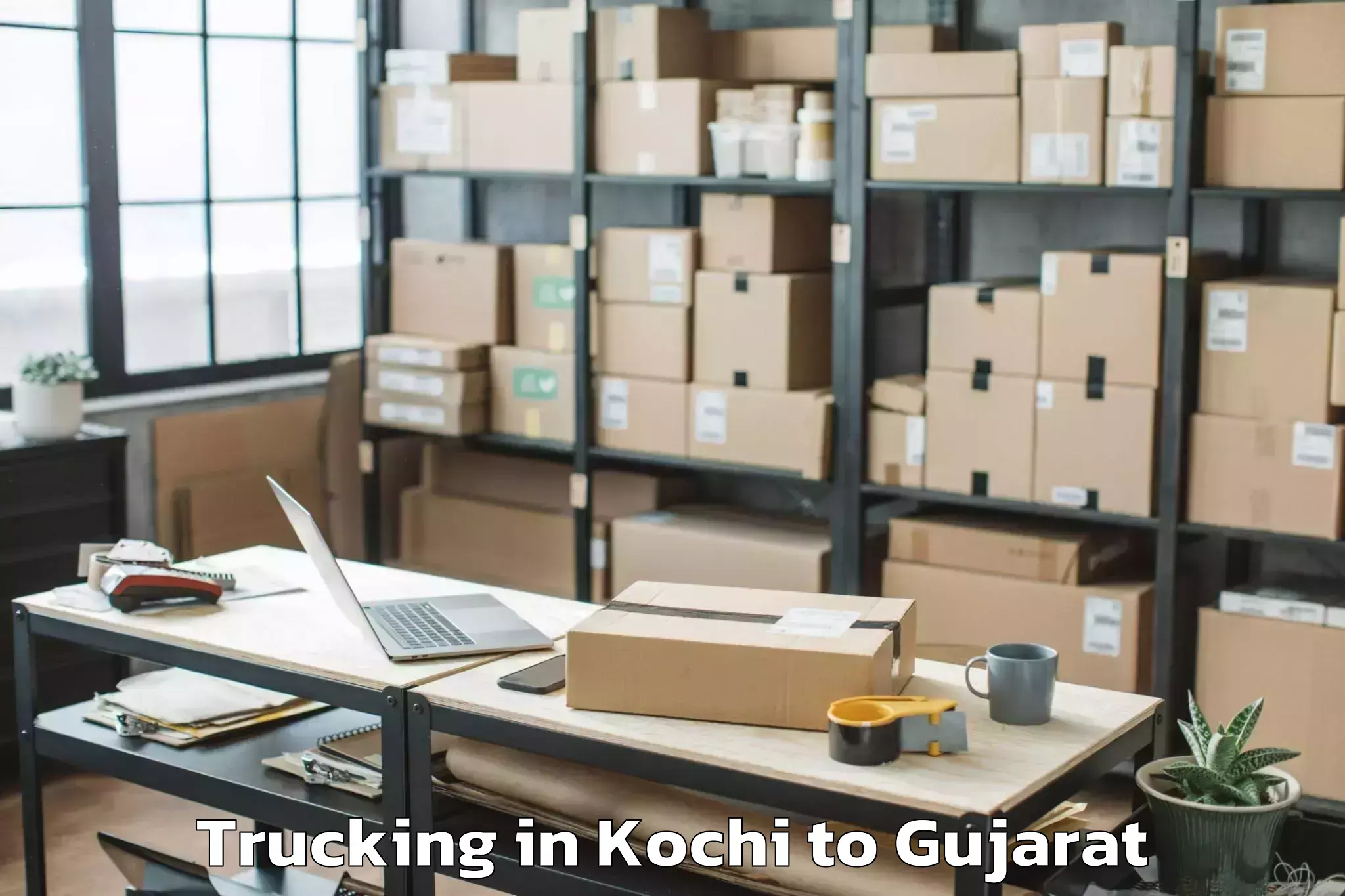 Kochi to Rajkot Airport Raj Trucking